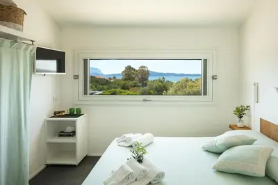 Letto o letti in una camera di Sardegna è - Beach Apartments