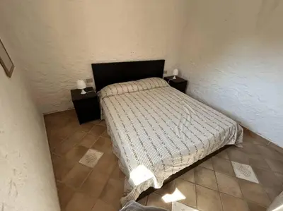 Letto o letti in una camera di House in Villaggio Nuragheddu