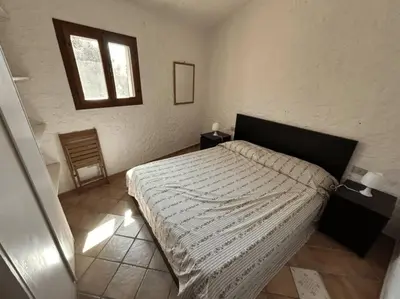 Letto o letti in una camera di House in Villaggio Nuragheddu