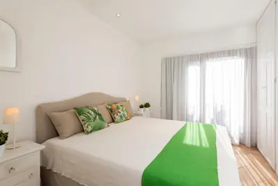 Letto o letti in una camera di Villa Ginepro