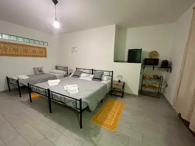 Letto o letti in una camera di Il Rifugio delle parole