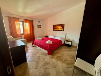 Letto o letti in una camera di Villetta Saba