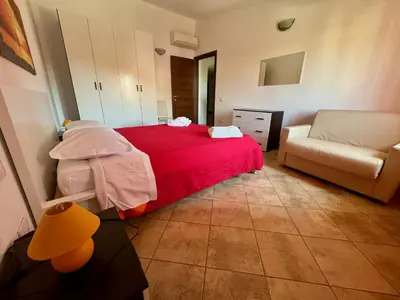 Letto o letti in una camera di Villetta Saba