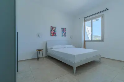 Letto o letti in una camera di Villa Infinity with Pool by Wonderful Italy