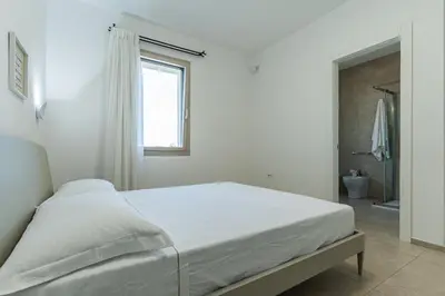 Letto o letti in una camera di Villa Infinity with Pool by Wonderful Italy