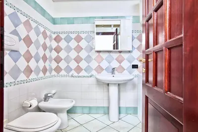 Bagno di ISA-Residence with swimming-pool in Ottiolu just 250 mt from the sea, apartments with air conditioning and private outdoor area