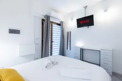 Letto o letti in una camera di Urban Rooms