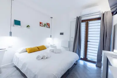 Letto o letti in una camera di Urban Rooms
