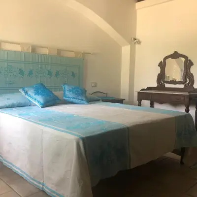 Letto o letti in una camera di NicChia Turchese