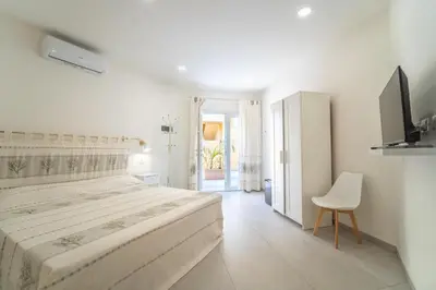 Letto o letti in una camera di La Stampa Room