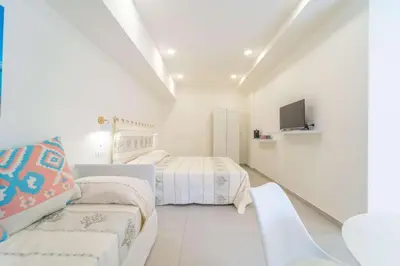 Letto o letti in una camera di La Stampa Room
