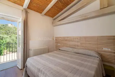 Letto o letti in una camera di Villa Canto Antico