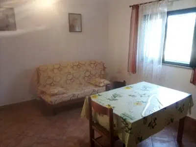 Area soggiorno di Appartamento villa delle Arance 300mt dalla spiaggia