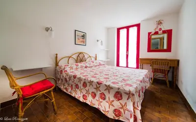 Letto o letti in una camera di Hotiday Apartments Case Bianche