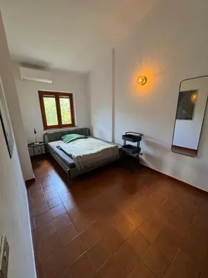 Letto o letti in una camera di Beachhouse Casa del Mare Sardegna