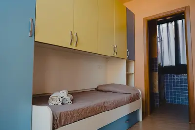Letto o letti in una camera di Casa Carpe Diem