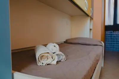 Letto o letti in una camera di Casa Carpe Diem