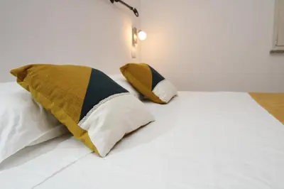 Letto o letti in una camera di Alba Apartment