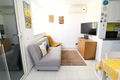 TV o dispositivi per l'intrattenimento presso Alba Apartment