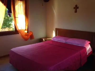 Letto o letti in una camera di Casa Magnolia