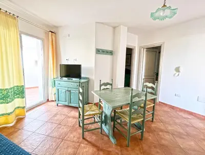 TV o dispositivi per l'intrattenimento presso Apartments In Golfo Orosei