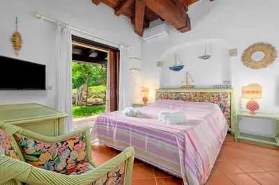Letto o letti in una camera di Villa Beth
