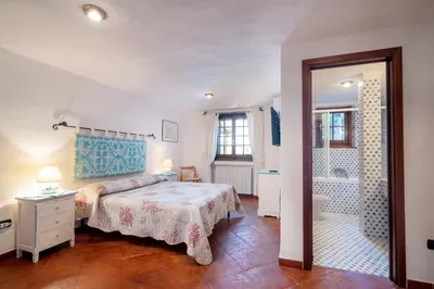 Letto o letti in una camera di Villa Sogno Indaco