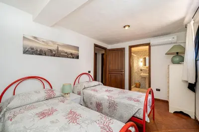 Letto o letti in una camera di Villa Sogno Indaco