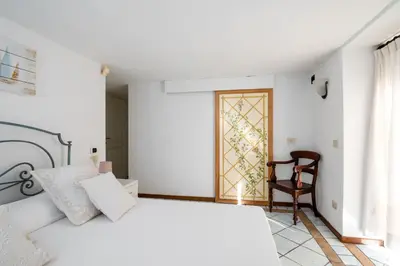 Letto o letti in una camera di Villa Mimosa