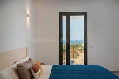 Letto o letti in una camera di Villa Thia