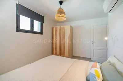 Letto o letti in una camera di Villa Thia