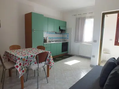 Cucina o angolo cottura di Casa Budoni gemütliche Ferienwohnung Zentral doch ruhig gelegen 1km vom Strand
