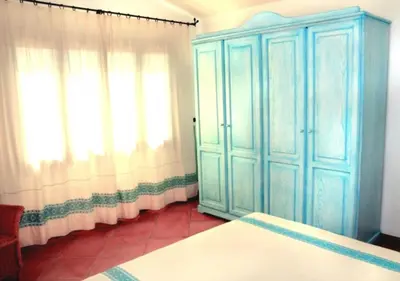 Letto o letti in una camera di Marinella Residence