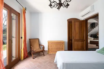 Letto o letti in una camera di Villa Calyra by Klodge
