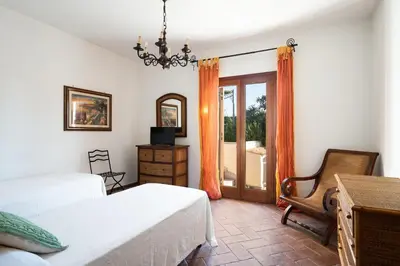Letto o letti in una camera di Villa Calyra by Klodge