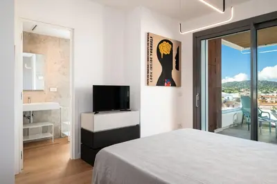 Letto o letti in una camera di Alfiere Arc Loft by Klodge