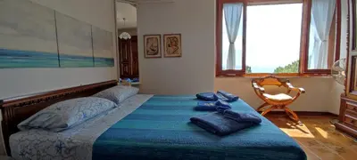 Letto o letti in una camera di La bouganville Apartments