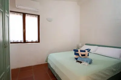 Letto o letti in una camera di Breeze of the Coast by Wonderful Italy