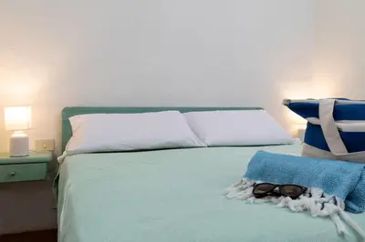 Letto o letti in una camera di Breeze of the Coast by Wonderful Italy