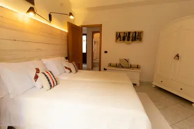 Letto o letti in una camera di Domo de Ciu Nenneddu