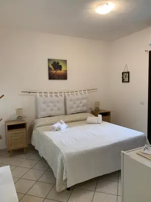 Letto o letti in una camera di Affittacamere La Petra Longa