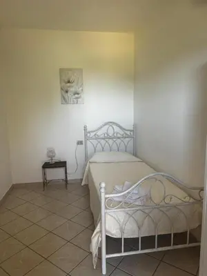 Letto o letti in una camera di Affittacamere La Petra Longa