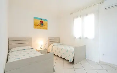 Letto o letti in una camera di Angel Village