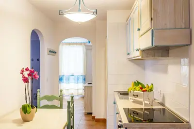 Cucina o angolo cottura di Baia Orosei Apartments Ac