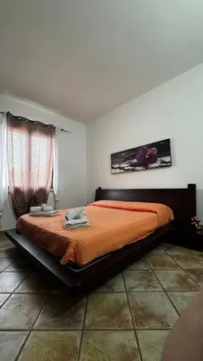 Letto o letti in una camera di Le residenze del mare bilocale