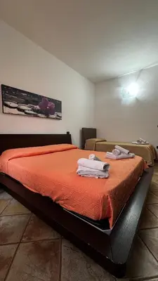 Letto o letti in una camera di Le residenze del mare bilocale
