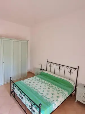 Letto o letti in una camera di Dimora San Pietro
