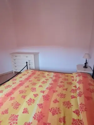 Letto o letti in una camera di Dimora San Pietro