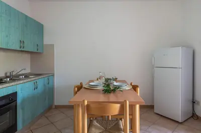 Cucina o angolo cottura di Budoni Homes Seaside, Ac And Bike