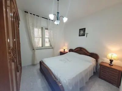 Letto o letti in una camera di Appartamento da Caterina